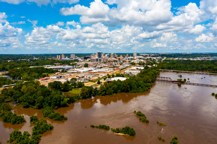 Jackson, MS Skyline with flooding Pearl River in the foreground in August 2022