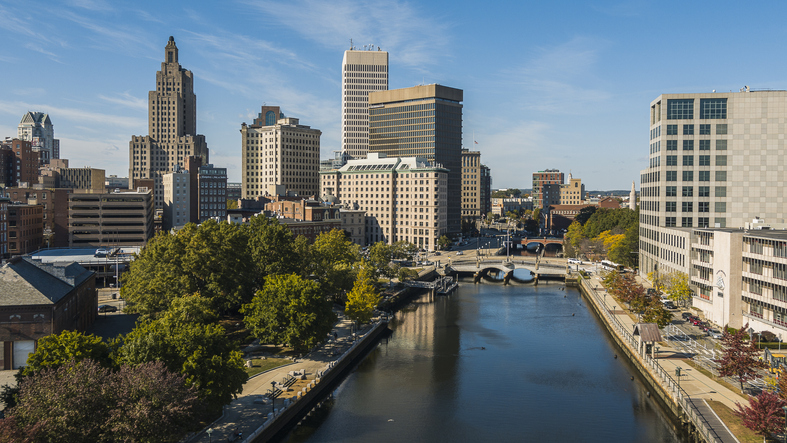 Providence, Rhode Island Downtown view from over the Providence River, with Crawford Street Bridge and College Street t the distance.