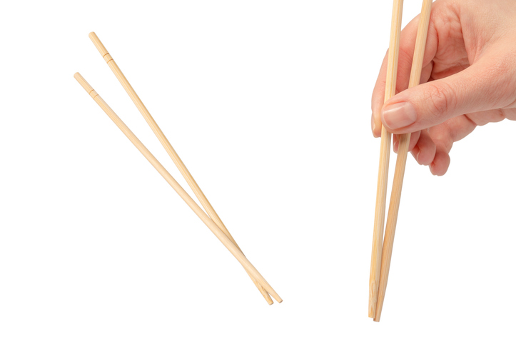 Sushi chopsticks isolated on a white background.