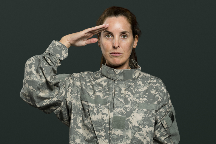 Female soldier in salute gesture