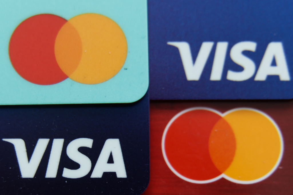 Judge rejects $30 billion Visa, Mastercard swipe-fee settlement