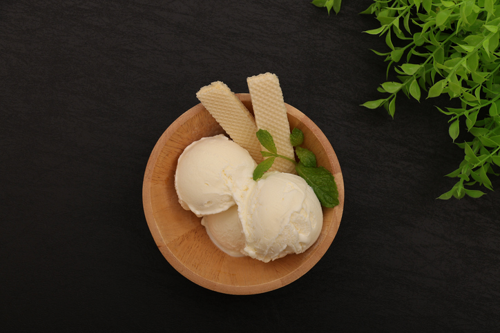 Vanilla ice cream and mint served in a bowl