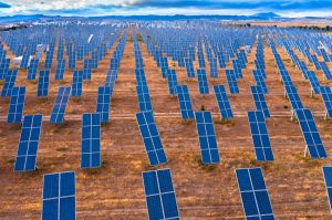 Aerial view of a solar power station and solar energy panels in a rural field. Navarre, Spain. Europe. Environment concept