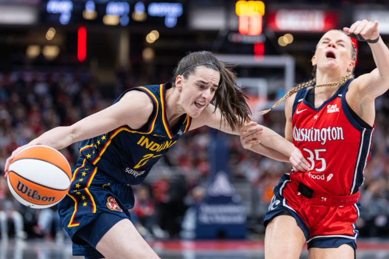 Caitlin Clark Dribbles Against Julie Vanloo