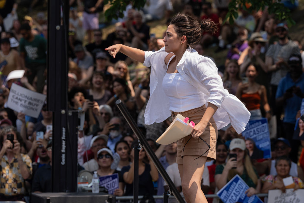 Congresswoman Alexandria Ocasio-Cortez seen on stage during...