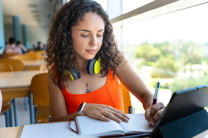Bright library study: student using technology