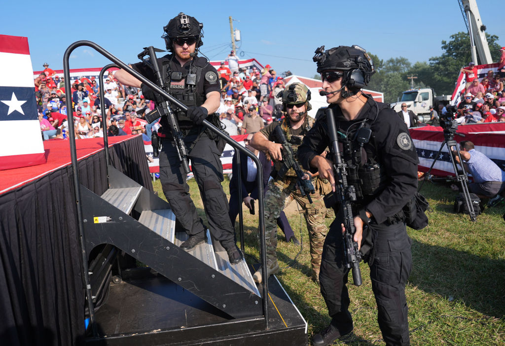 BUTLER, PENNSYLVANIA - July 13: Members of law enforcement walk