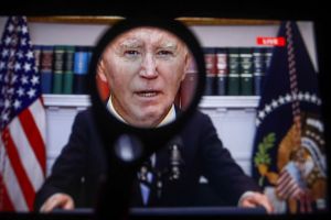 In this photo illustration of a screen, current US President...