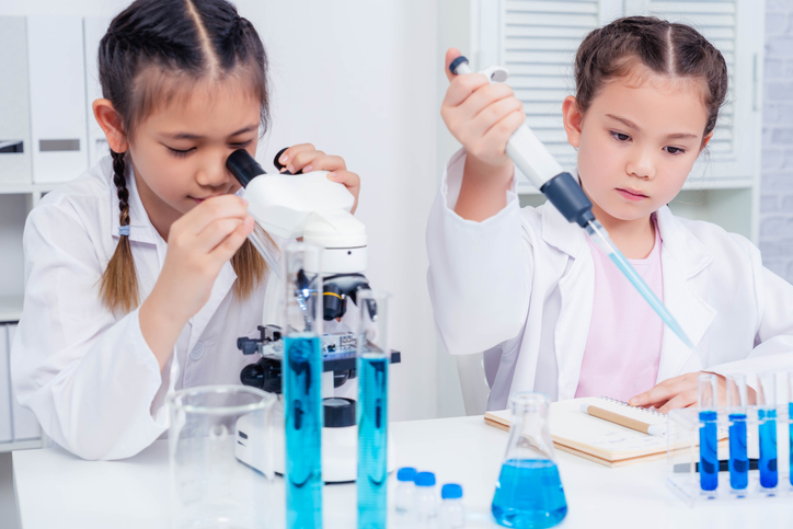 Focused Young Scientists in Lab