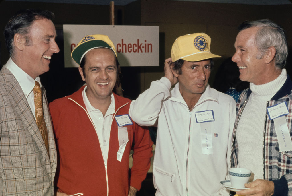 Bob Newhart with a group of other celebrities, United States, circa 1970s.