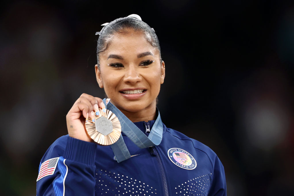 Romania says gymnast will get disputed bronze medal Friday despite ongoing US challenge