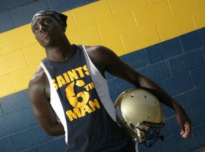 Cierre Wood (CQ), 17, poses for a portrait before football practice at Santa Clara High School in O