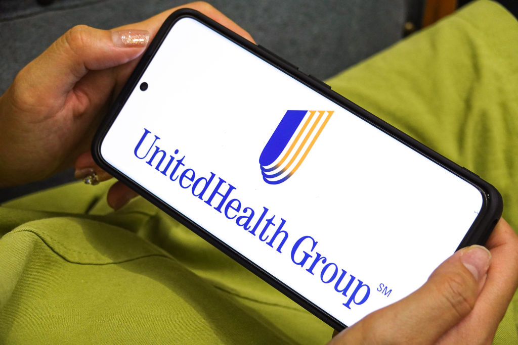In this photo illustration the UnitedHealth Group logo...