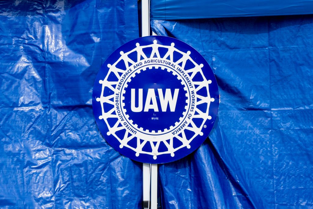 United Auto Workers on strike at the Stellantis parts distribution center in Plymouth, Minnesota. UAW logo at the strike site.