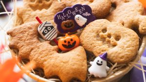 Handmade Halloween candy. Halloween pumpkin cookies and ghost cookies.