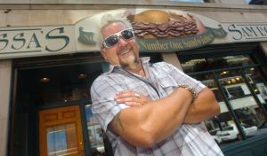 (07/28/09 Boston, Ma) Food network star Guy Fieri pays a visit to the hub. Portrait of Fieri in front of Sam LaGrassa's sandwich shop. Weds and archive