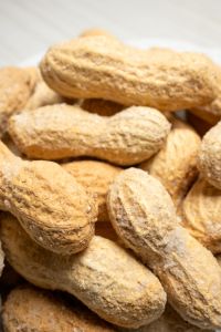 salted fresh shelled peanuts on rotating background