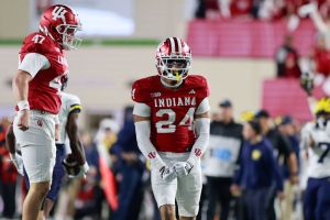 Indiana Hoosiers defensive lineman Finn Walters (47) and...