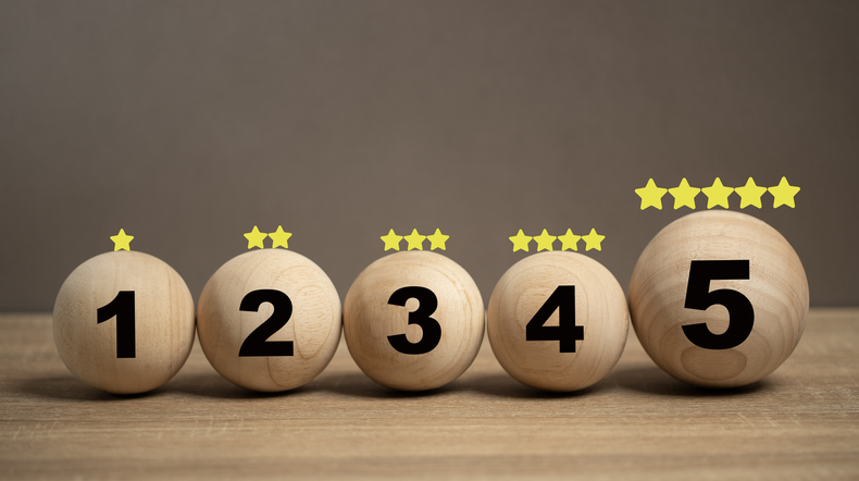 Smile icon showing satisfaction in service on the table. Survey, questionnaire, business service rating. It’s show the feedback and rating for business and marketing. The success performance.