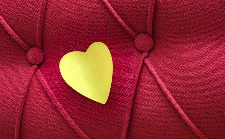 Yellow heart on unique vintage background.