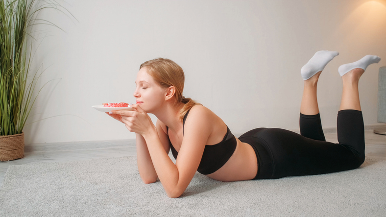 Calorie cake sweet craving lady smelling plate
