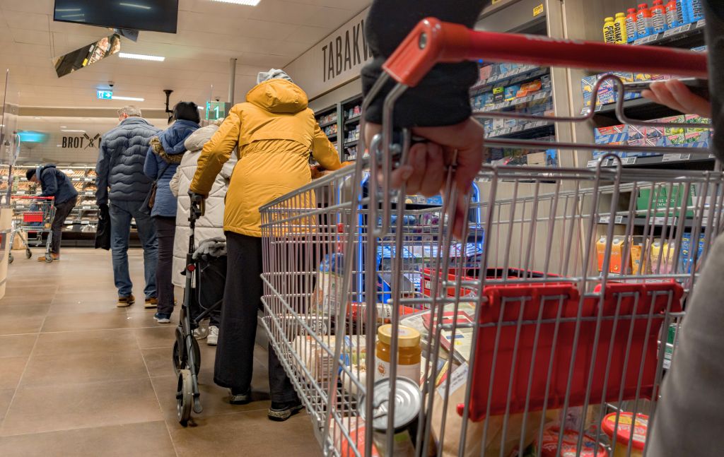Customers waiting in the supermarket