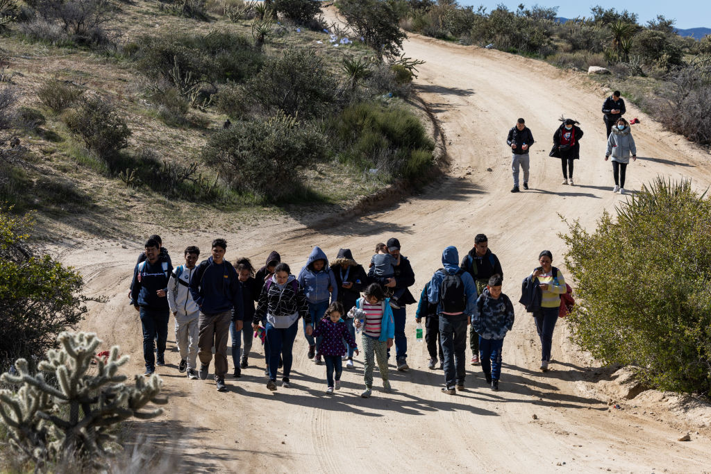 Migrants At The US-Mexico Border