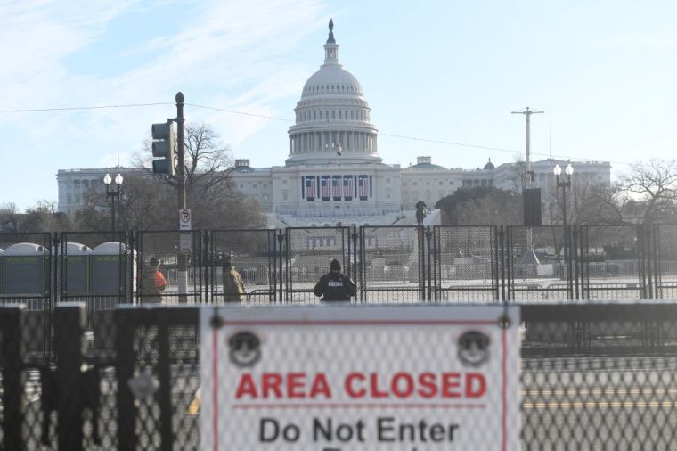 Law enforcement stand guard outside the US Capitol on inauguration day