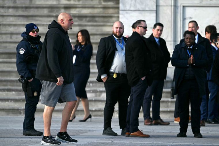 US Senator John Fetterman (2nd L) arrives for the inauguration