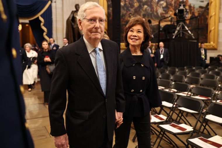 U.S. Sen. Mitch McConnell (R-KY) arrives with his wife, former U.S. Secretary of Transportation Elaine Chao to the inauguration