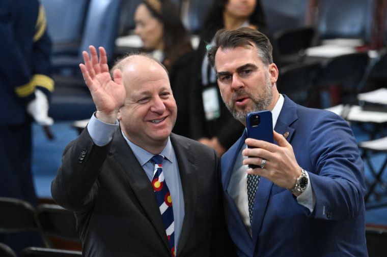 (L-R) Colorado Governor Jared Polis and Oklahoma Governor Kevin Stitt arrive for the inauguration