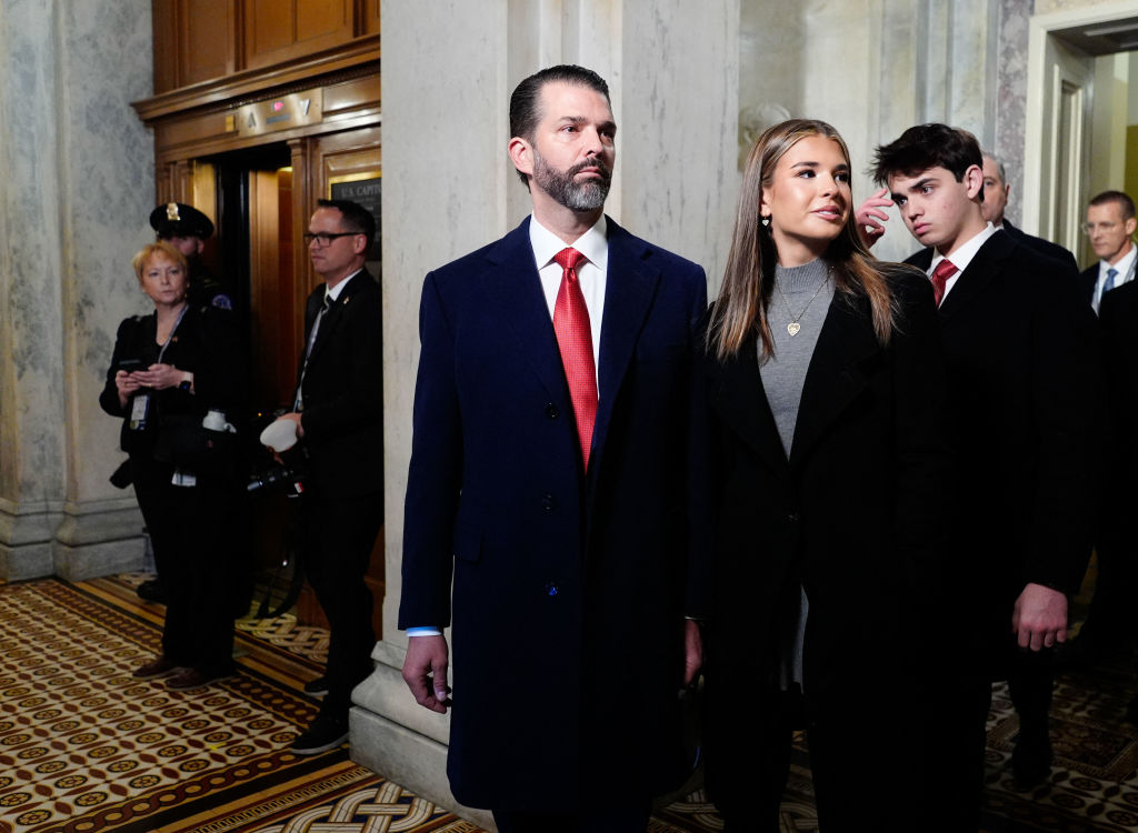 Donald Trump Jr (L) and his daughter Kai Madison Trump arrives for the inauguration