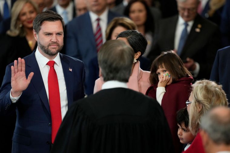 JD Vance is sworn in as U.S. vice president by Supreme Court Justice Brett Kavanaugh as Usha Vance holds the Bible