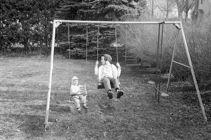 A swing set in autumn 1965