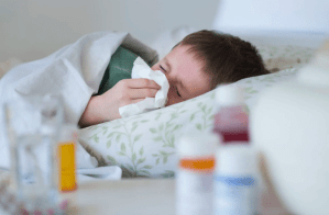 Kid Sick in Bed