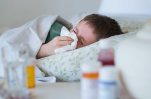 Kid Sick in Bed