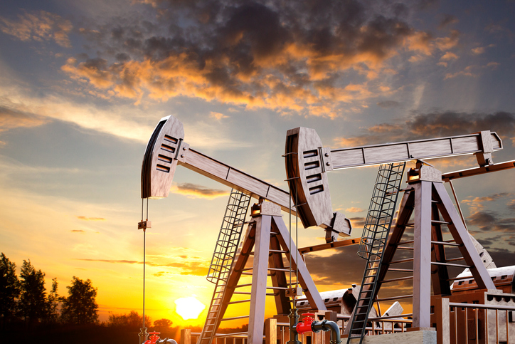 Oil well pumpjacks against the sunset