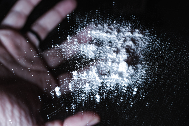 Fentanyl and drug abuse powder on mirror