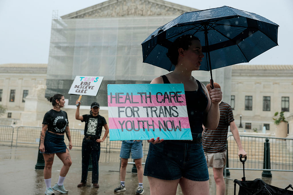 Transgender Rights Advocates Rally Against The Supreme Court's Ban On Gender-Affirming Youth Care