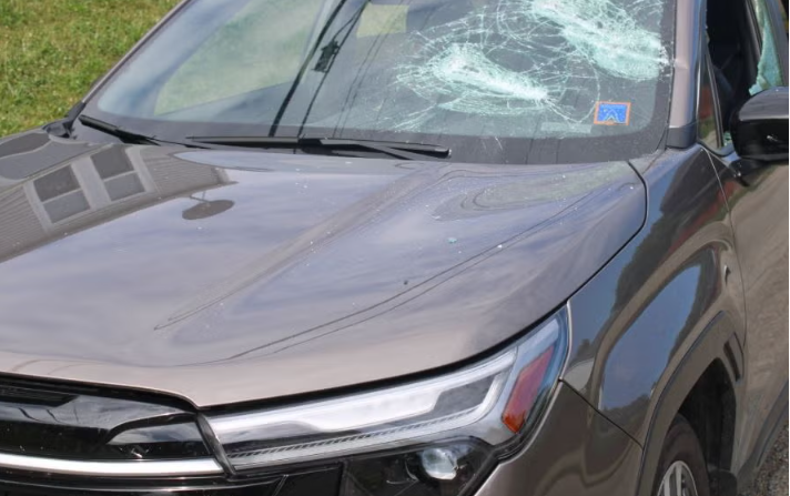 SUV with Broken Window