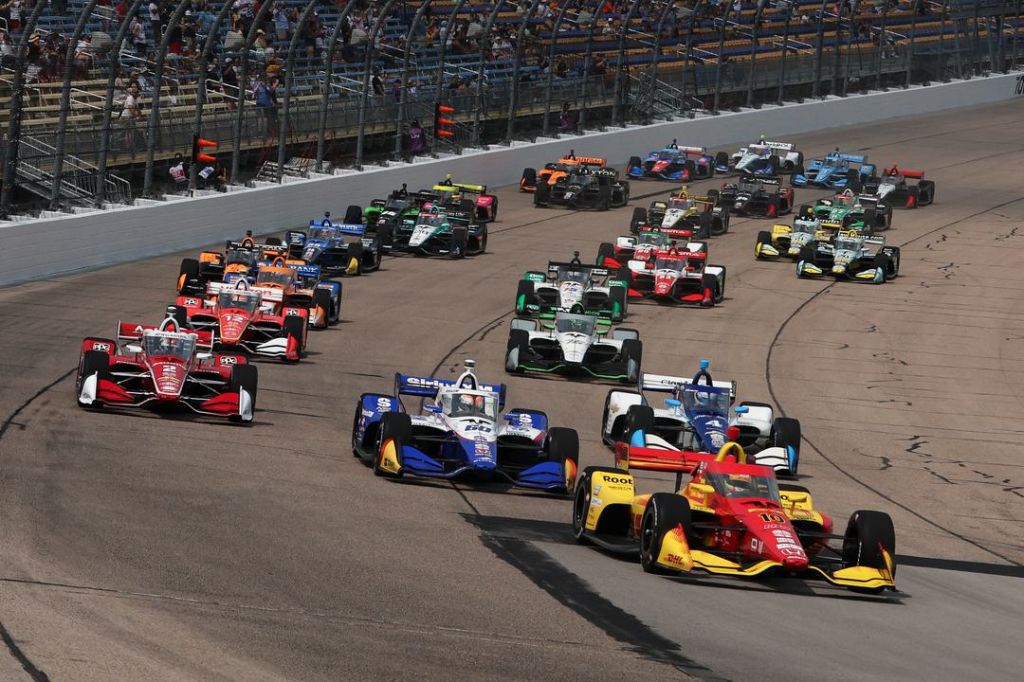 Alex Palou leading the first lap at Iowa Race Two in 2025.
