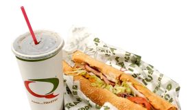 Quiznos sub sandwich and trademark soda cup.