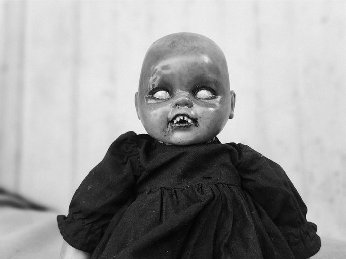 Scary horror vintage doll Creepy doll Halloween concept, Close up of Ghost doll mystic in abandoned places background