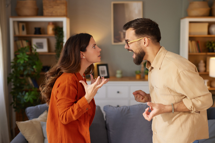 Couple arguing during a relationship problems conflict at home