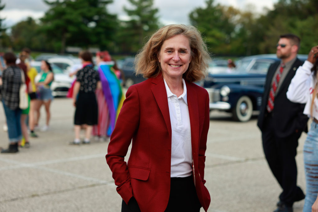 Indiana University President Pamela Whitten talks to members...