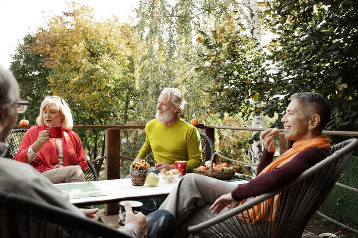 Seniors socializing on the terrace