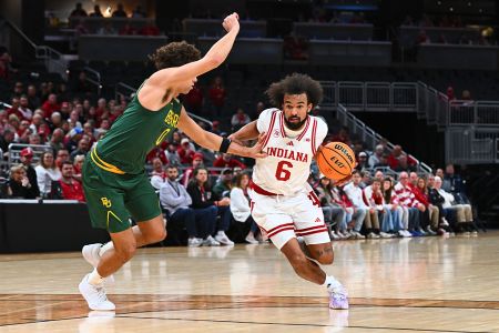Tayton Conerway of the Hoosiers Drives on Baylor's Dan Skillings Jr