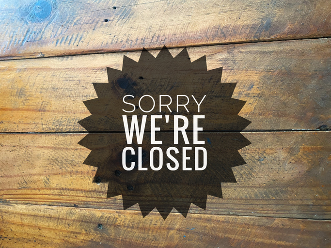 Sorry We're Closed written message.