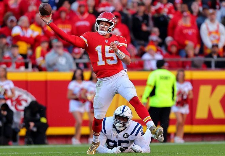 Patrick Mahomes #15 of the Kansas City Chiefs attempts a pass while under pressure