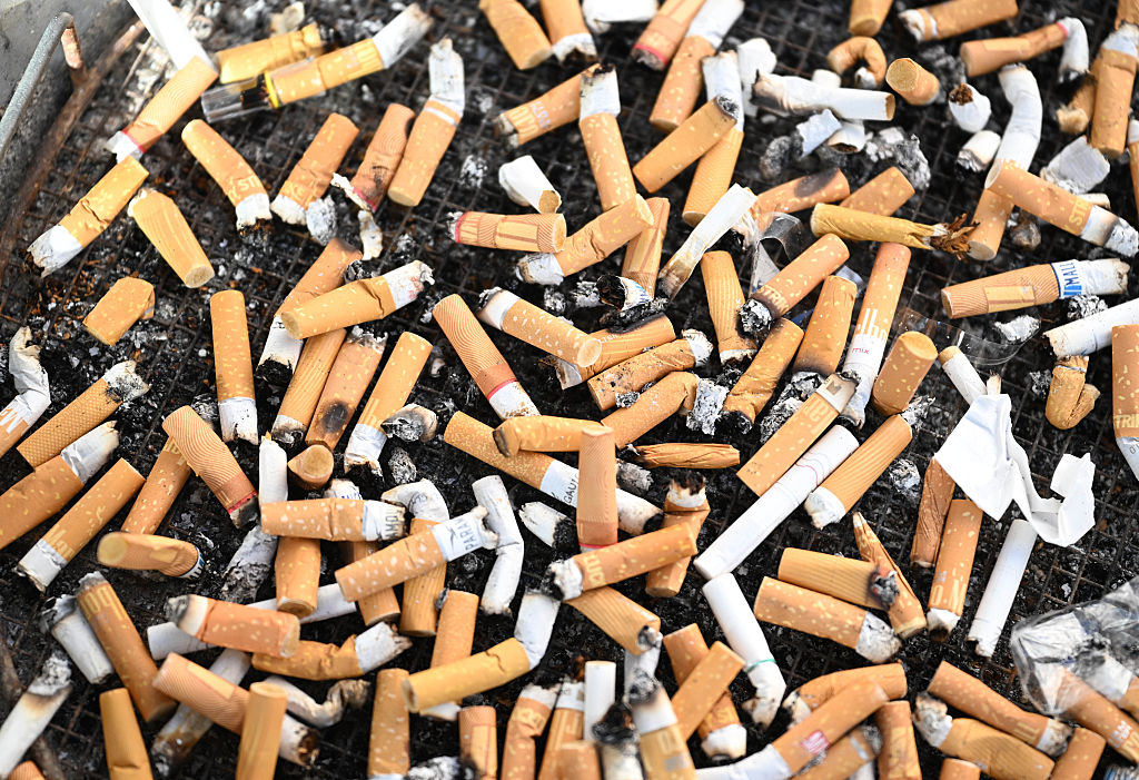 Cigarette butts in ashtrays